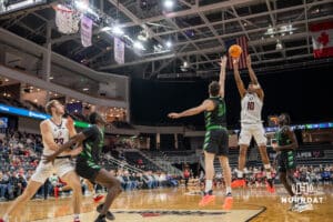 Omaha Mavericks Marquel Sutton making a jump shot against the North Dakota Fighting Hawks during a college basketball game on Thursday, February 6, 2025, in Omaha, Nebraska. Photo By Sam Brennan.