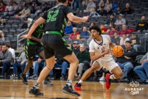 Omaha Mavericks Lance Waddles dribbles the ball against the North Dakota Fighting Hawks during a college basketball game on Thursday, February 6, 2025, in Omaha, Nebraska. Photo By Sam Brennan.