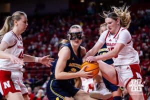 Nebraska Cornhuskers guard Kendall Moriarty (15) goes for a rebound against Michigan Wolverines forward Alyssa Crockett (20)during a college women’s basketball game on Wednesday, February 6, 2025 in Lincoln, Nebraska. Photo by John S. Peterson.