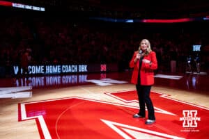 The new head volleyball coach Dani Busboom-Kelly speaks to the fans after the first quarter during a college women’s basketball game against the Michigan Wolverines on Wednesday, February 6, 2025 in Lincoln, Nebraska. Photo by John S. Peterson.