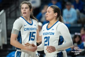 Creighton Bluejays Lauren Jensen and Molly Mogensen chat during a college basketball game against Seton Hall on February 5th, 2025 in Omaha Nebraska. Photo by Brandon Tiedemann.