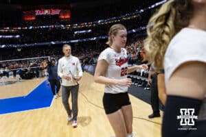 Nebraska head coach John Cook walks off the court after the loss to Texas during the NCAA Finals on Sunday, December 17, 2023, in Tampa, Florida. Photo by John S. Peterson.