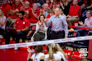 Nebraska Cornhusker head coach John Cook gives a fist pump after a point against the Ohio St. Buckeyes in the first set during a college volleyball match in Lincoln, Nebraska, Friday, September 23, 2023. Photo by John Peterson.