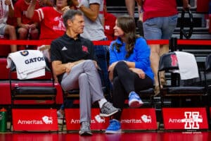 Nebraska head coach John Cook and Ole Miss head coach Kayla Banworth sit down and talk before the match during a college volleyball match Saturday, Sept., 3, 2022, in Lincoln, Neb. Photo by John S. Peterson.