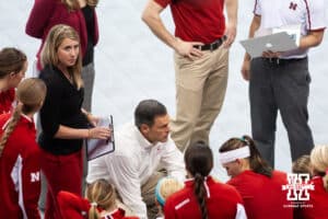 December 13, 2013: Nebraska head coach John Cook talks to the players at a time out against San Diego during Regionals, in Omaha, Nebraska. Photo by John S. Peterson