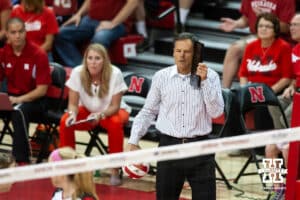 October 4, 2013:Nebraska head coach John Cook giving instructions to the team against Minnesota in Lincoln, Nebraska. Photo by John S. Peterson.