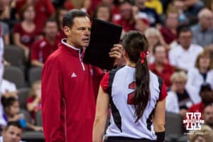August 26, 2012: Nebraska Cornhuskers Coach John Cook talks to Lauren Cook #2 during the match against the Notre Dame Fighting Irish at the CenturyLink Center in Omaha, Nebraska. Nebraska swept Notre Dame 25-19, 25-21, and 25-13. Photo by John S. Peterson.