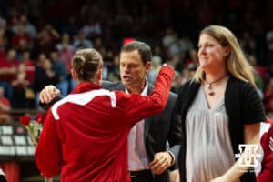 24 November 2010: Nebraska head coach John Cook hugs Kayla Banworth for Senior Day against Baylor in Lincoln,Nebraska. Photo by John S. Peterson.