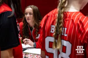 Nebraska pitcher Jordyn Bahl signing autographs during softball fan day, February 1, 2025 in Lincoln, Nebraska. Photo by John S. Peterson.