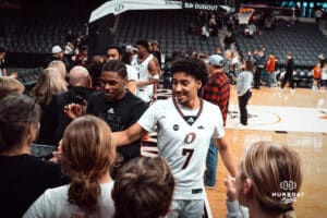 UNO Mavericks player, Lance Waddles, celebrates a win with fans during a college basketball game on Feb 01, 2025 in Omaha, Nebraska. Photo by Logan Hock