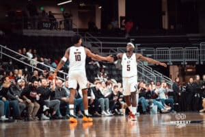 UNO Mavericks players, Marquel Sutton and Ja'Sean Glover, celebrate their lead during a college basketball game on Feb 01, 2025 in Omaha, Nebraska. Photo by Logan Hock