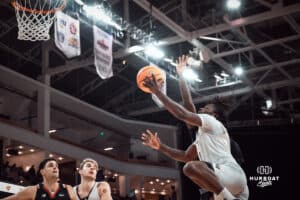UNO Mavericks player, JJ White, going for a lay-up during a college basketball game on Feb 01, 2025 in Omaha, Nebraska. Photo by Logan Hock