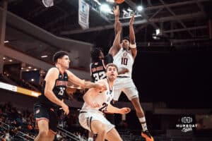 UNO Mavericks player, Marquel Sutton, takes a shot during a college basketball game on Feb 01, 2025 in Omaha, Nebraska. Photo by Logan Hock