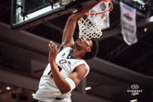 UNO Mavericks player, Marquel Sutton, going for a rebound during a college basketball game on Feb 01, 2025 in Omaha, Nebraska. Photo by Logan Hock