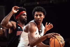 UNO Mavericks player, Marquel Sutton, facing off against opponent during a college basketball game on Feb 01, 2025 in Omaha, Nebraska. Photo by Logan Hock