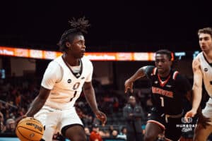 UNO Mavericks player, JJ White, drives to the paint during a college basketball game on Feb 01, 2025 in Omaha, Nebraska. Photo by Logan Hock