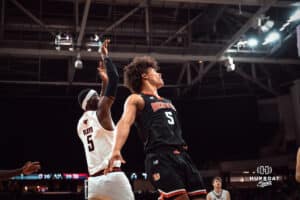 UNO Mavericks player, Ja'Sean Glover, takes a shot during a college basketball game on Feb 01, 2025 in Omaha, Nebraska. Photo by Logan Hock