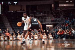 UNO Mavericks player, JJ White, looks for an open lane during a college basketball game on Feb 01, 2025 in Omaha, Nebraska. Photo by Logan Hock