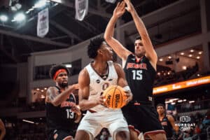 UNO Mavericks player, Marquel Sutton, looks for an open shot during a college basketball game on Feb 01, 2025 in Omaha, Nebraska. Photo by Logan Hock