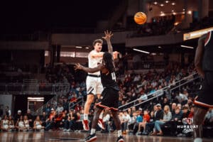 UNO Mavericks player, Tony Osburn, makes a pass during a college basketball game on Feb 01, 2025 in Omaha, Nebraska. Photo by Logan Hock