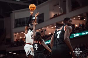 UNO Mavericks player, Ja'Sean Glover, takes a shot during a college basketball game on Feb 01, 2025 in Omaha, Nebraska. Photo by Logan Hock