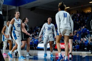 Creighton Bluejays hype up Kiani Lockett against the Providence Friars during a basketball game at Sokol Arena on Sunday, February 02, 2025, in Omaha, Nebraska. Photo by Collin Stilen.