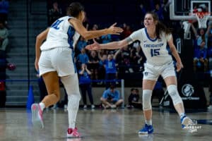 Creighton Bluejays Jayme Horan and Lauren Jensen celebrating the bucket during a basketball game at Sokol Arena on Sunday, February 02, 2025, in Omaha, Nebraska. Photo by Collin Stilen.