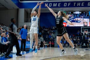 Creighton Bluejay Morgan Maly with the deep three-point attempt against the Providence Friars during a basketball game at Sokol Arena on Sunday, February 02, 2025, in Omaha, Nebraska. Photo by Collin Stilen.