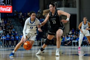 Creighton Bluejay Kiani Lockett (11) drives to the bucket during a basketball game against the Providence Friars at Sokol Arena on Sunday, February 02, 2025, in Omaha, Nebraska. Photo by Collin Stilen.