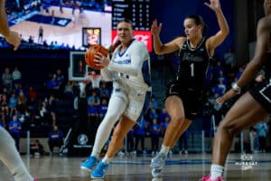 Creighton Bluejay Molly Mogensen looking for a pass during a basketball game against the Providence Friars at Sokol Arena on Sunday, February 02, 2025, in Omaha, Nebraska. Photo by Collin Stilen.