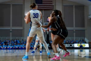Creighton Bluejay Morgan Maly looks to beat defender during a basketball game against the Providence Friars at Sokol Arena on Sunday, February 02, 2025, in Omaha, Nebraska. Photo by Collin Stilen.