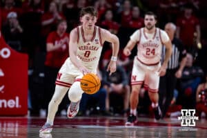Nebraska Cornhuskers guard Connor Essegian (0) dribbles the ball down the court against the Illinois Fighting Illini in the second half during a college basketball game, Thursday, January 30, 2025, in Lincoln, Nebraska. Photo by John S. Peterson.