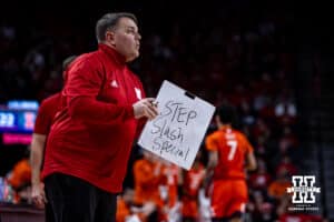 Nebraska Cornhuskers assistant coach Adam Howard holding a sign for the player against the Illinois Fighting Illini in the first half during a college basketball game, Thursday, January 30, 2025, in Lincoln, Nebraska. Photo by John S. Peterson.