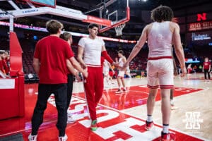 Nebraska Cornhuskers forward Berke Buyuktuncel (9) giving fives warming up before taking on Illinois Fighting Illini during a college basketball game, Thursday, January 30, 2025, in Lincoln, Nebraska. Photo by John S. Peterson.