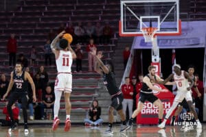 South Dakota Coyotes guard Dre Bullock (11) makes a three-point shot against the Omaha Mavericks late in the second half during a college basketball game, Wednesday, January 29, 2025, in Vermillion, South Dakota. Photo by John S. Peterson.