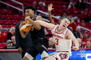 Omaha Mavericks forward Marquel Sutton (10) pulls the ball away from South Dakota Coyotes guard Max Burchill (3) in the second half during a college basketball game, Wednesday, January 29, 2025, in Vermillion, South Dakota. Photo by John S. Peterson.