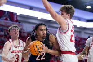 Omaha Mavericks forward Kamryn Thomas (22) drives to the basket against South Dakota Coyotes guard Paul Bruns (23) in the second half during a college basketball game, Wednesday, January 29, 2025, in Vermillion, South Dakota. Photo by John S. Peterson.