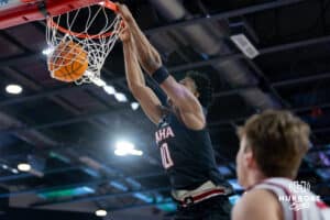 Omaha Mavericks forward Marquel Sutton (10) makes a dunk against the South Dakota Coyotes in the second half during a college basketball game, Wednesday, January 29, 2025, in Vermillion, South Dakota. Photo by John S. Peterson.