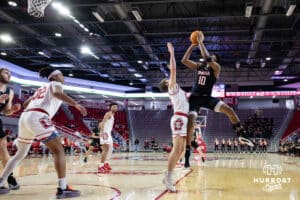Omaha Mavericks forward Marquel Sutton (10) makes a jump shot against South Dakota Coyotes guard Isaac Bruns (12) in the first half during a college basketball game, Wednesday, January 29, 2025, in Vermillion, South Dakota. Photo by John S. Peterson.