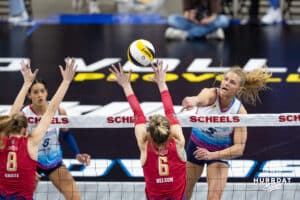 Omaha Supernova Brooke Nuneviller (5) spikes the ball against Grand Rapid Rise Marin Grote (8) and Grand Rapid Rise Kaleigh Nelson (6) during a professional volleyball match Sunday, March 30, 2025 in Omaha, Nebraska. Photo by John S. Peterson.