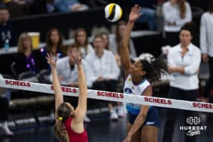 Omaha Supernova Kaitlyn Hord (23) spikes the ball against Grand Rapid Rise Ali Bastianelli (10) during a professional volleyball match Sunday, March 30, 2025 in Omaha, Nebraska. Photo by John S. Peterson.