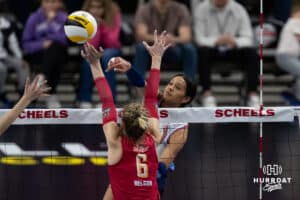 Omaha Supernova Reagan Cooper (8) spikes the ball against Grand Rapid Rise Kaleigh Nelson (6) during a professional volleyball match Sunday, March 30, 2025 in Omaha, Nebraska. Photo by John S. Peterson.
