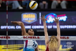 Omaha Supernova Kayla Caffey (28) spikes the ball against Grand Rapid Rises Carli Snyder (4) during a professional volleyball match Sunday, March 30, 2025 in Omaha, Nebraska. Photo by John S. Peterson.