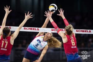 Omaha Supernova Brooke Nuneviller (5) spikes the ball against Grand Rapids Rise Kaleigh Nelson (6) and Alyssa Jensen (17) during a professional volleyball match Sunday, March 30, 2025 in Omaha, Nebraska. Photo by John S. Peterson.