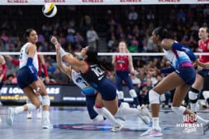 Omaha Supernova Natalia Valentin-Anderson (1) and Camila Gomez (10) dive for the ball against the Grand Rapids Rise during a professional volleyball match Sunday, March 30, 2025 in Omaha, Nebraska. Photo by John S. Peterson.