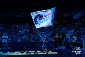 Omaha Supernovas Spirit Squad leads the Novas out with the flag to take on the Grand Rapids Rise during a professional volleyball match Sunday, March 30, 2025 in Omaha, Nebraska. Photo by John S. Peterson.