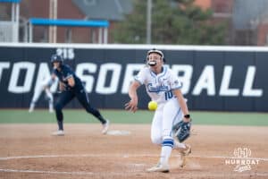 Creighton Bluejays Brooke Shifflett pitches during a college softball game against UCONN on March 28th, 2025 in Omaha, Nebraska. Photo by Brandon Tiedemann.
