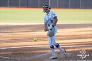 Creighton Bluejays Abby Rusher throw a pitch during a college softball game against UCONN on March 28th, 2025 in Omaha, Nebraska. Photo by Brandon Tiedemann.