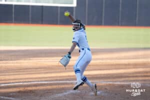 Creighton Bluejays Abby Rusher pitches during a college softball game against UCONN on March 28th, 2025 in Omaha, Nebraska. Photo by Brandon Tiedemann.