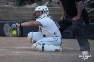 Creighton Bluejays Lily West catches during a college softball game against UCONN on March 28th, 2025 in Omaha, Nebraska. Photo by Brandon Tiedemann.